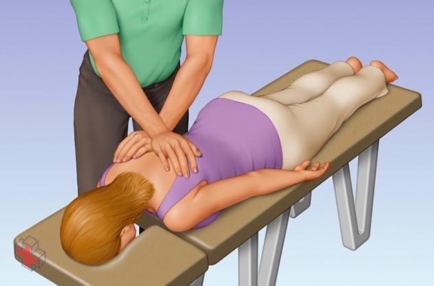 Person receiving a chiropractic adjustment