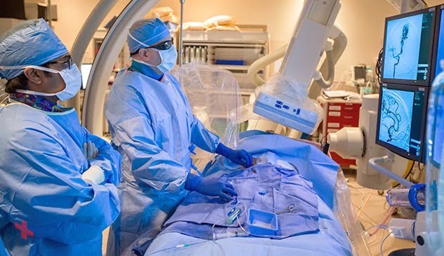 Mayo Clinic surgeons performing an endovascular procedure for brain aneurysm