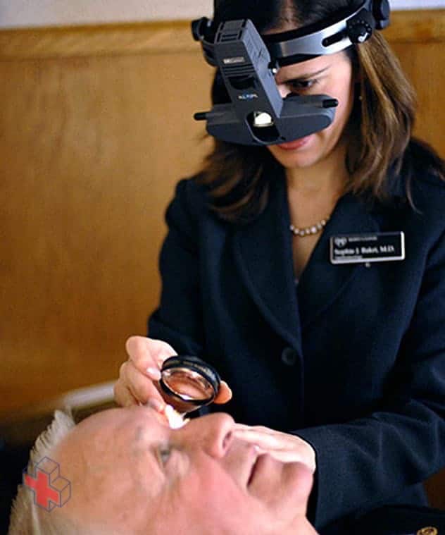 A man undergoing indirect ophthalmoscopy
