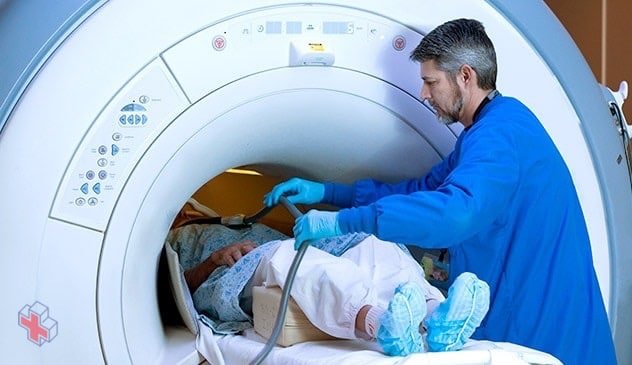 An MRI is administered to a person.